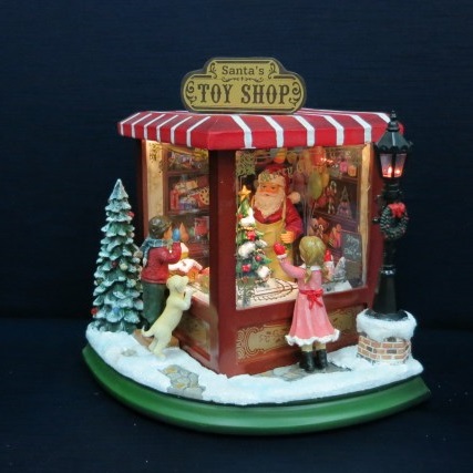 Параллель шоп елочные. Музыкальная шкатулка Santa's Toy shop. Новогодняя композиция магазин игрушек. Новогодний киоск игрушка. Новогодний сувенир магазин игрушек.